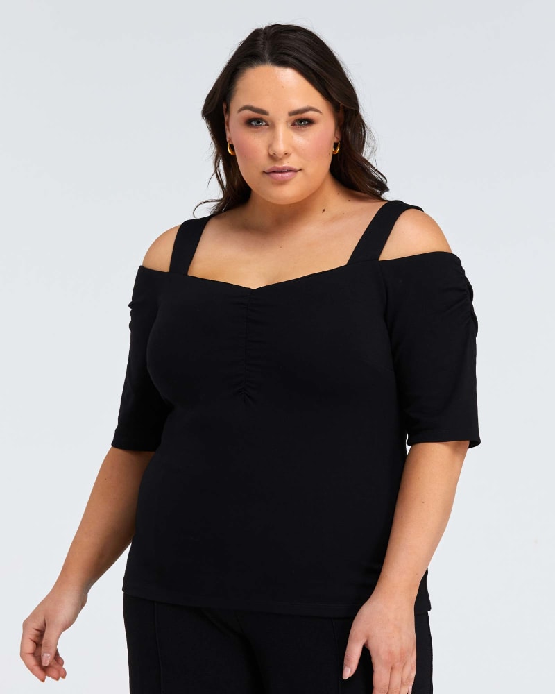 Side of a model wearing a size 3X Sacha Top in Black by Estelle. | dia_product_style_image_id:267340